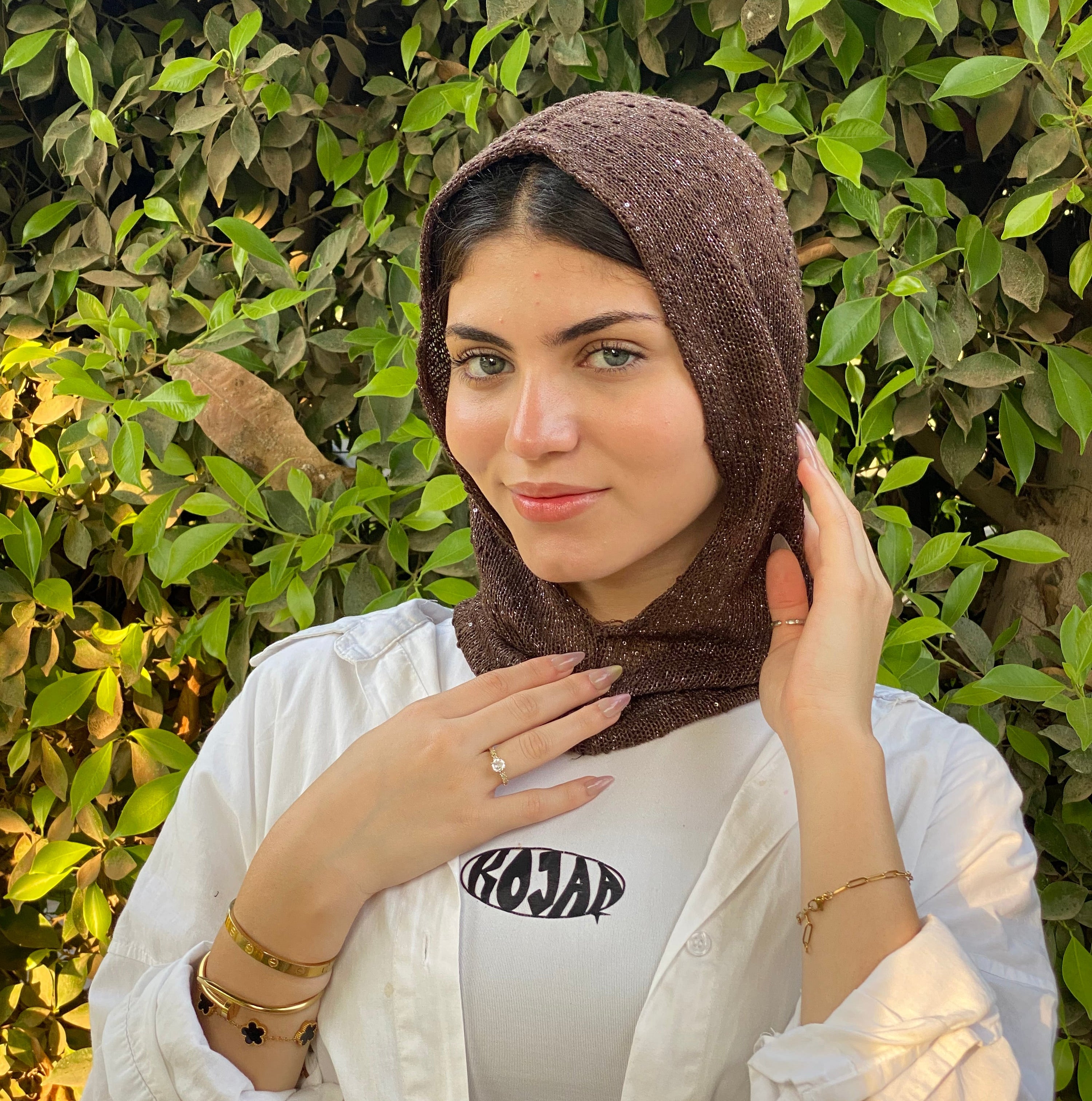 A Shimmer balaclava ( black- brown- gold- white)